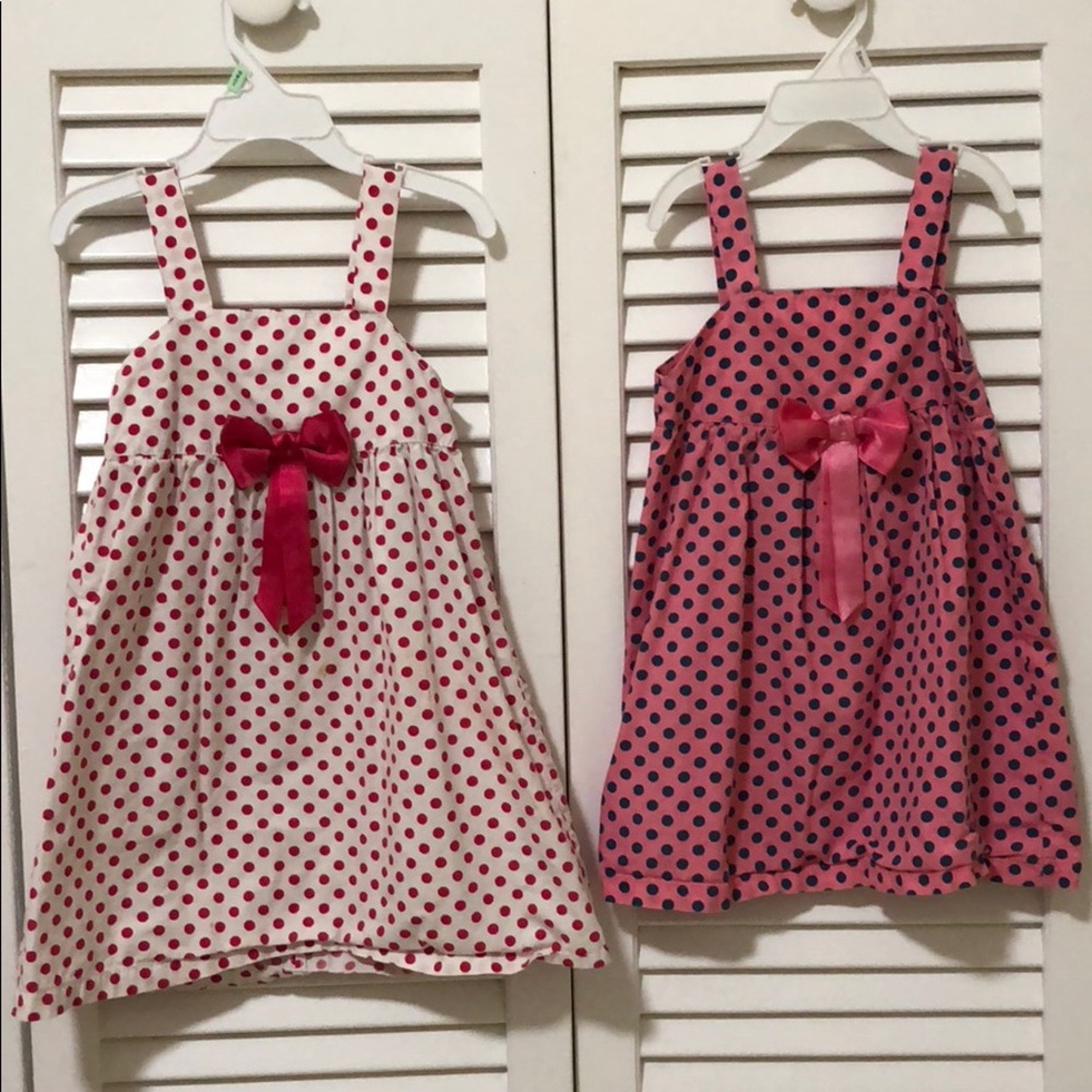 Two polka dotted dresses